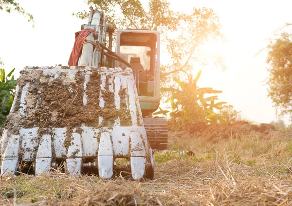 Excavator backhoe tractor at construction site — Stock Photo, Image