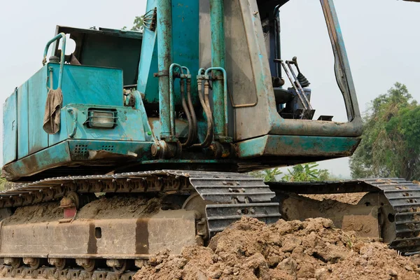 Excavator backhoe tractor at construction site — Stock Photo, Image