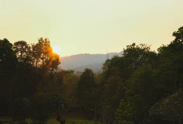 Sunrise sunset sunlight with mountain view — Stock Photo, Image