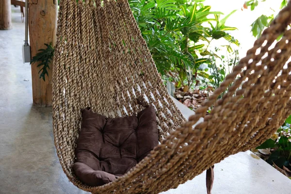 Cozy hammock cradle for relaxing on terrace near garden — Stock Photo, Image