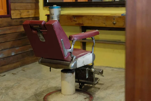 stylish vintage barber chair in salon interior