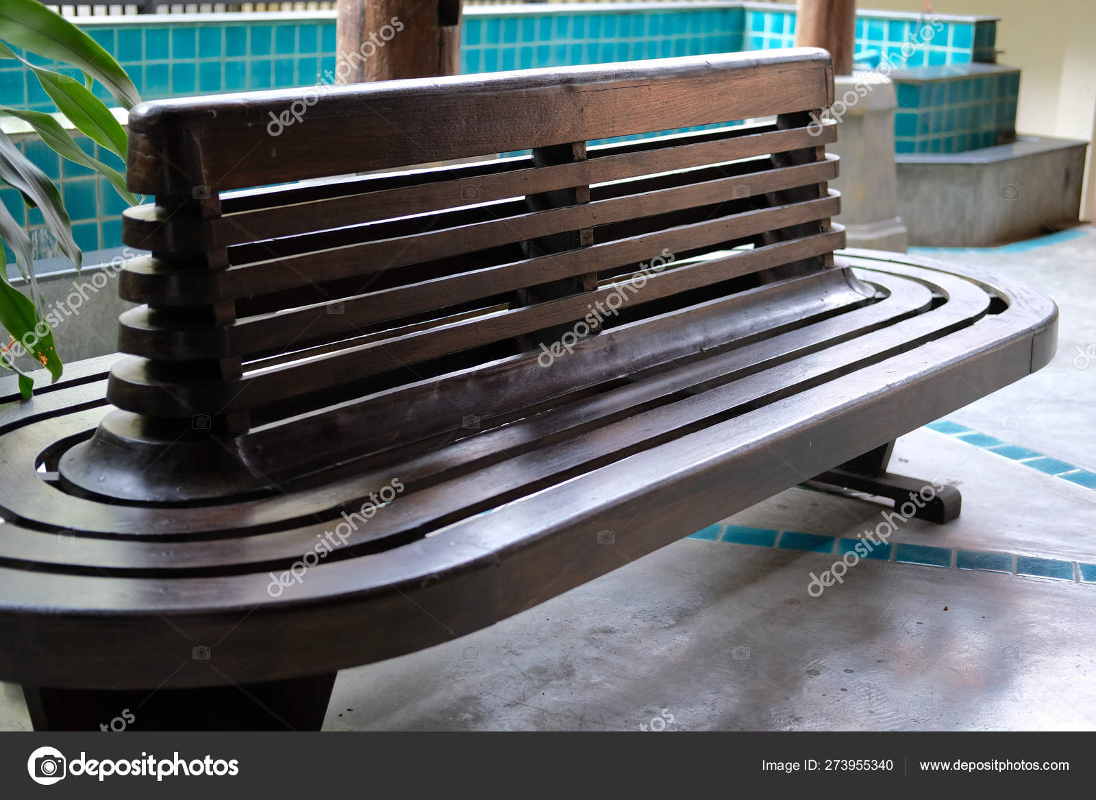 wooden bench waiting chair at railway train station 273955340