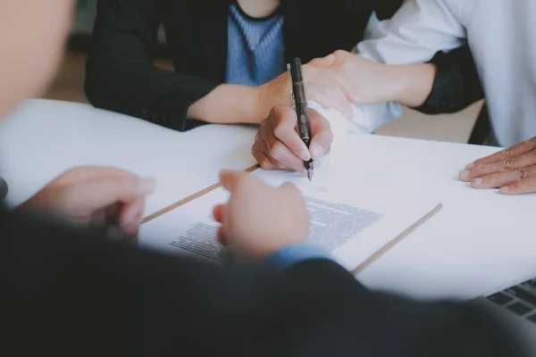 couple buying renting house signing mortgage contract agreement