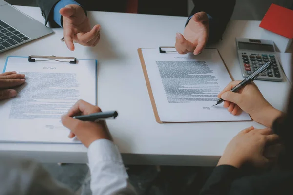 couple buying renting house signing mortgage contract agreement