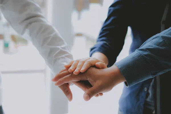 Businessman joining united hand, business team touching hands to — Stock Photo, Image