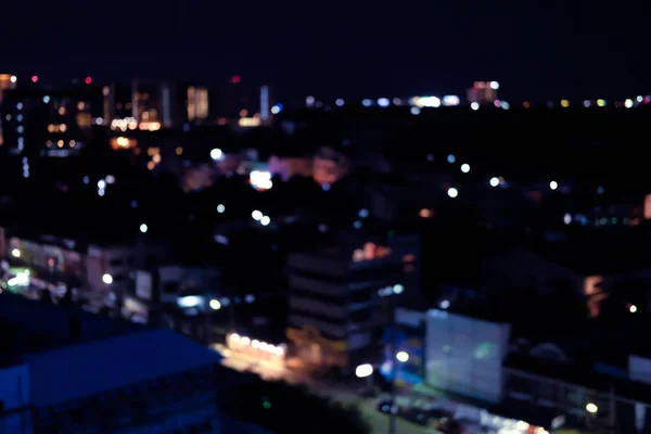 Ciudad noche luz bokeh desenfocado borrosa fondo — Foto de Stock