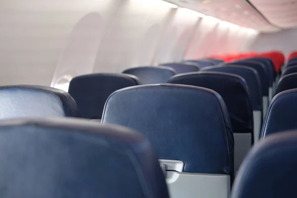 Asiento vacío del pasajero dentro del avión. silla en avión — Foto de Stock