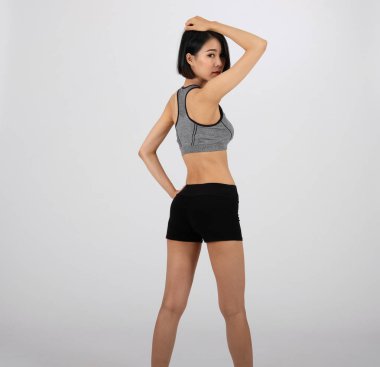 beyaz arka plan üzerinde spor giyim sportif kadın. sağlıklı spor fi