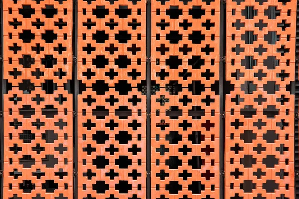 orange geometric wall fence. oriental ornament background