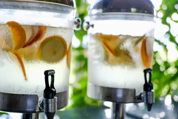 Orange lemon apple fruit slices floating in water. refreshing dr — Stock Photo, Image