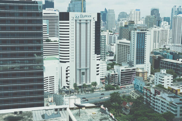 Bangkok, Thailand - August 14, 2020: skyscraper building cityscape in business area near Ploenjit road in Bangkok, Thailand on August 14, 2020.