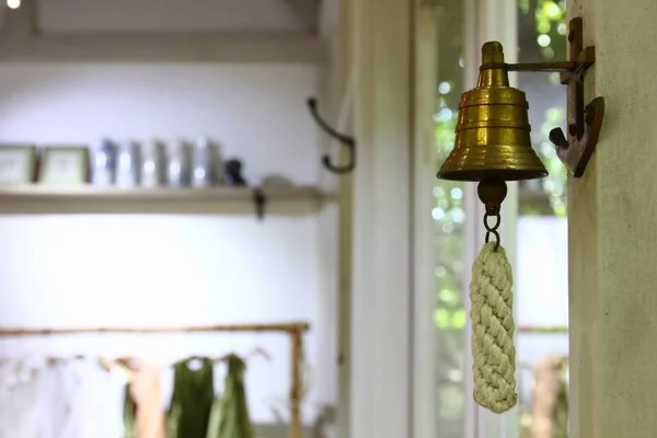 little brass bell in vintage shop