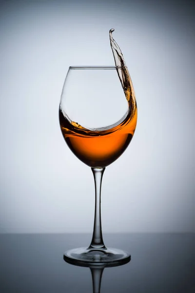 Amber Wine Splash Wine Glass Liquid Glass Traditional Wine According — Stock Photo, Image