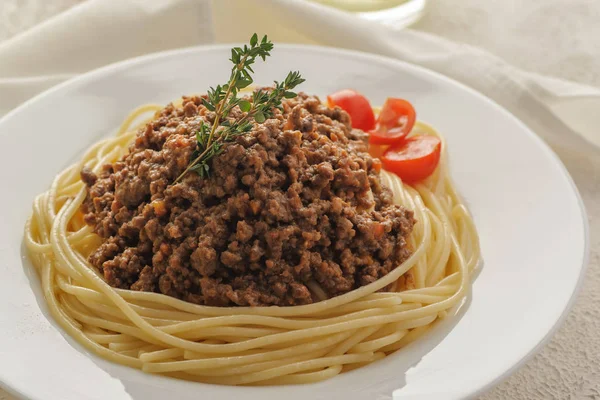 Spaghetti with bolognese meat sauce.