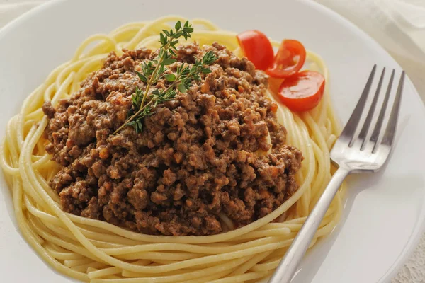 Spaghetti with bolognese meat sauce.