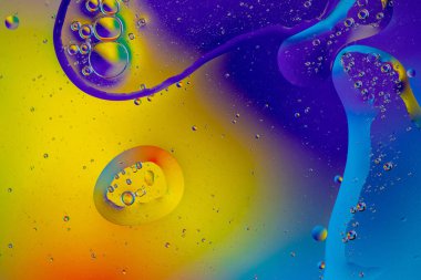 Soyut renkli arka plan yakın plan. Tasarım şablonu. Farklı renklerden yumuşak akış şekli. Makro Fotoğrafçılık. Seçici odak.