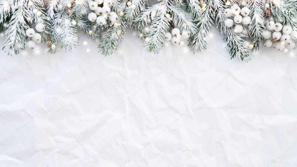 Christmas background with xmas tree on white creased background. Merry christmas greeting card, frame, banner. Winter holiday theme. Happy New Year. Space for text. Flat lay