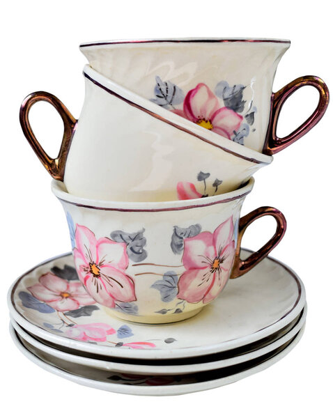 Luxury porcelain vintage tea cups with beautiful floral design in top and side view. Design elements isolated on white background.