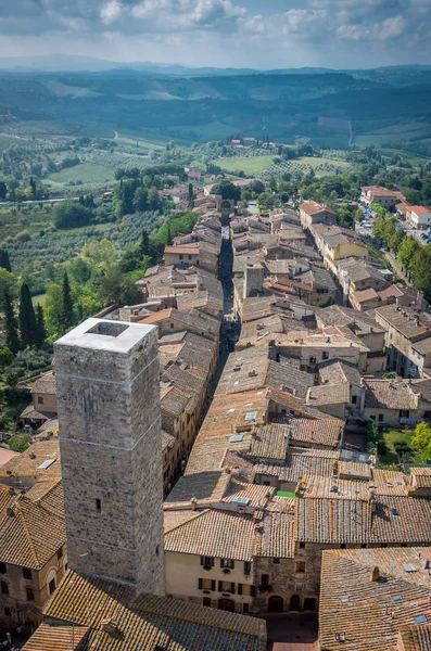Aerial wide-angle view of the historic town of San Gimignano with Tuscan countryside, Tuscany, Italy