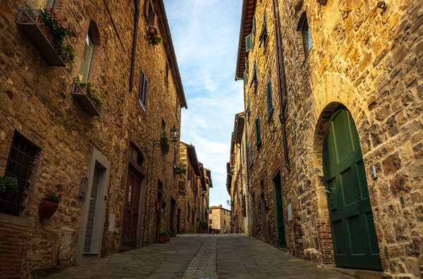 Narrow street in medieval village of San Donato in Poggio in the municipality of Tavarnelle Val di Pesa in Tuscany, Italy.