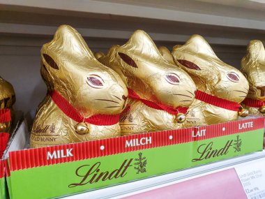 SHEFFIELD, UK - 20TH MARCH 2019: Lindt gold bunnys for sale in preperation for Easter inside Sheffield Tesco Extra store clipart