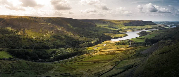 Stunning aerial panoramic shot of the Peak District National Park at the Woodhead to Torside reservoirs showing the streams of water connecting the two — Stock Photo, Image