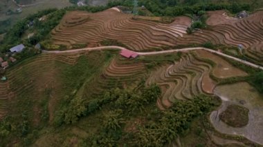 Aerial drone footage of rice terraces in Sapa, Northern Vietnam -October 2019