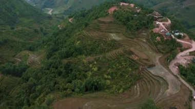 Aerial drone footage of rice terraces in Sapa, Northern Vietnam -October 2019