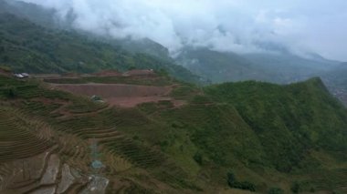Aerial drone footage of rice terraces in Sapa, Northern Vietnam -October 2019