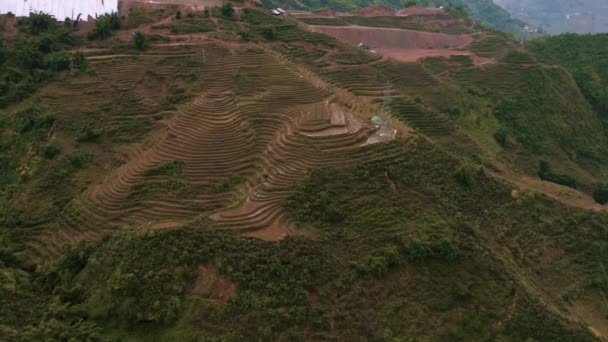 Aerial drone footage of rice terraces in Sapa, Northern Vietnam -October 2019 — Stockvideo