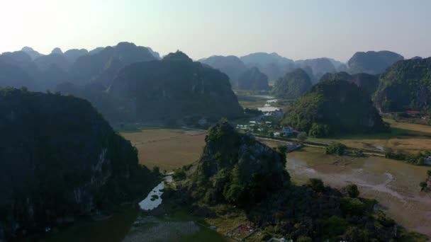 Aerial Drone footage of Ninh Binh and Tam Coc from the sky during Sunset - October 2019 — ストック動画