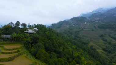 Aerial drone footage of rice terraces in Sapa, Northern Vietnam -October 2019