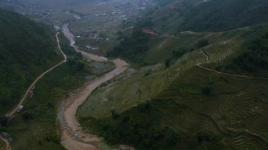 Aerial drone footage of rice terraces in Sapa, Northern Vietnam -October 2019