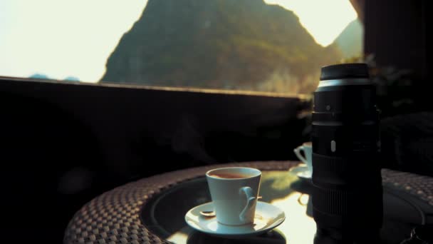 Relaxing with coffee in Ha Long Bay in Vietnam at Sunset — Stock Video