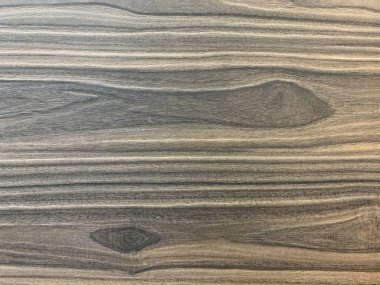 Arkaplan dokusu: ahşap bir yüzeyin yapısı. Dekoratif kaplamalı tahta, yakın plan. Mobilya yapmak için malzeme.