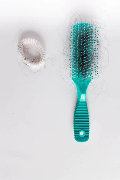 Hairs fall in comb, hair fall everyday serious problem.Cross processing and Split tone instragram like process — Stock Photo, Image