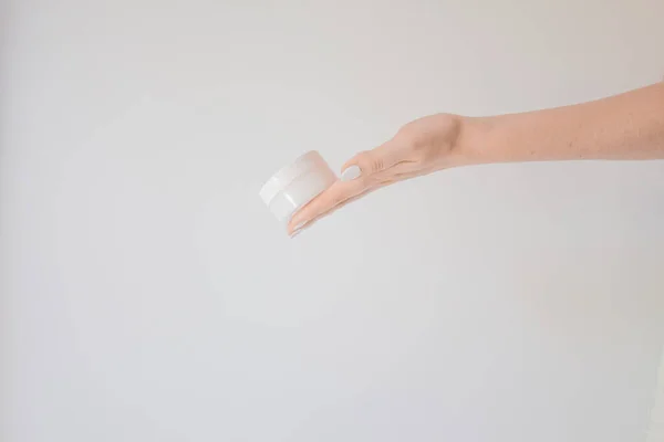 Plastic Jar Cream Female Hand Isolated White Professional Cosmetics Restore — Stock Photo, Image