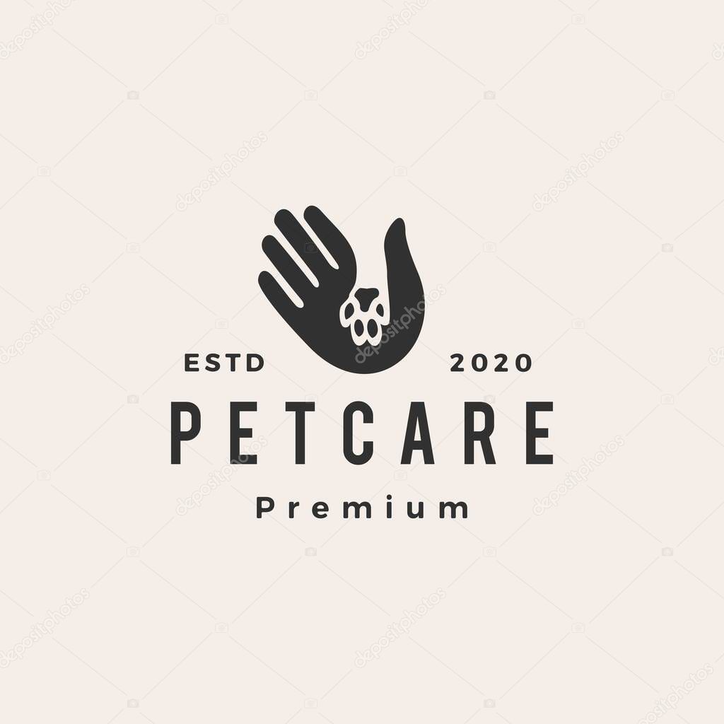 Pet care hand hipster vintage logo vector icon illustration