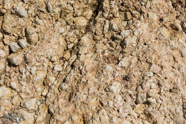 Braune Felsoberfläche an einem sonnigen Tag — Stockfoto