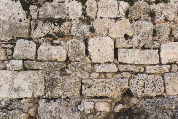 Antigua textura de la superficie de la pared de piedra. Detalle de primer plano . —  Fotos de Stock