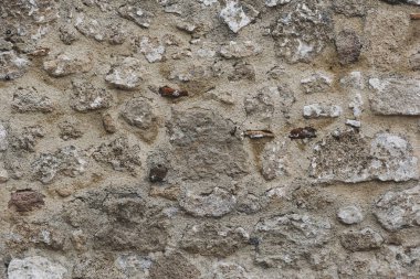 Eski kaba taş duvar. Antik duvar.