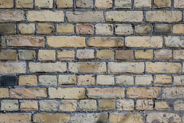 old shabby light brick wall