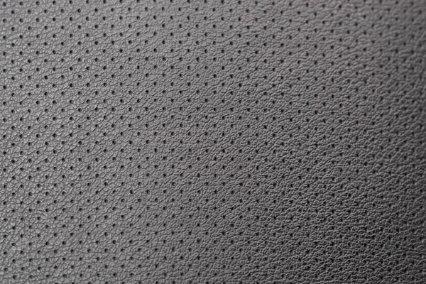 perforated leather on the chair, black leather