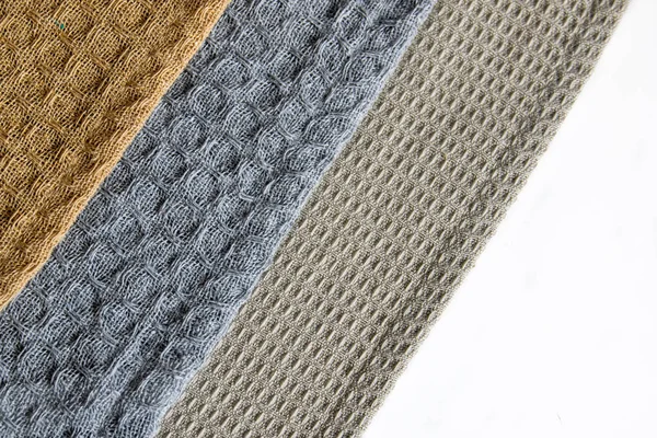 Textura de tecido de perto. Três toalha de cozinha de algodão diferente em — Fotografia de Stock