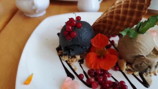 Charcoal and chicory ice cream and waffle with fresh berries — Stock Video