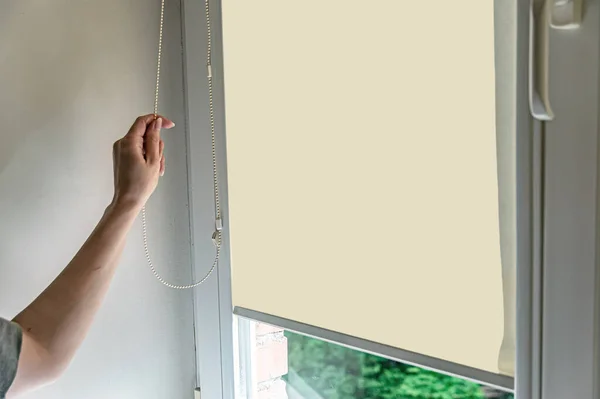 Closeup Woman Hand Opens Roll Blinds Window Modern Interior Roll — Stock Photo, Image