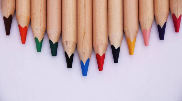 Colored pencils close up in macro photography. Art set of pencils with free space. — Stock Photo, Image