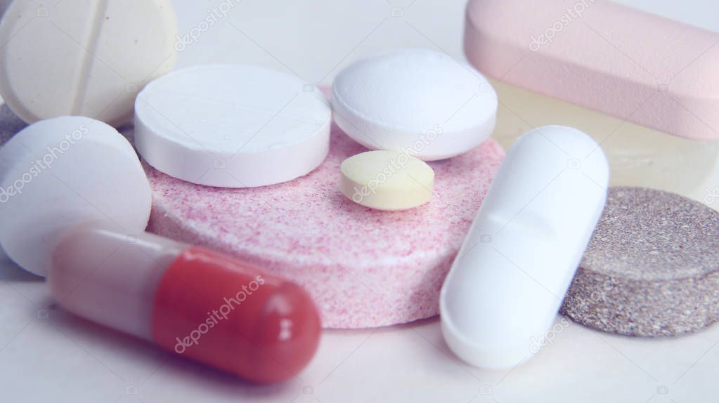 Pharmacy theme, tablets, pills capsule heap mix therapy drugs with medicine antibiotic. Close up of capsules. Medicine background for medical concept.