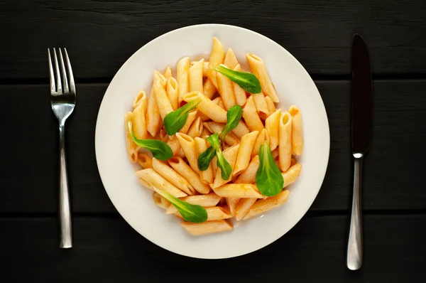 Pasta Tomato Sauce Served Green Leaves Stone Black Background — Stock Photo, Image