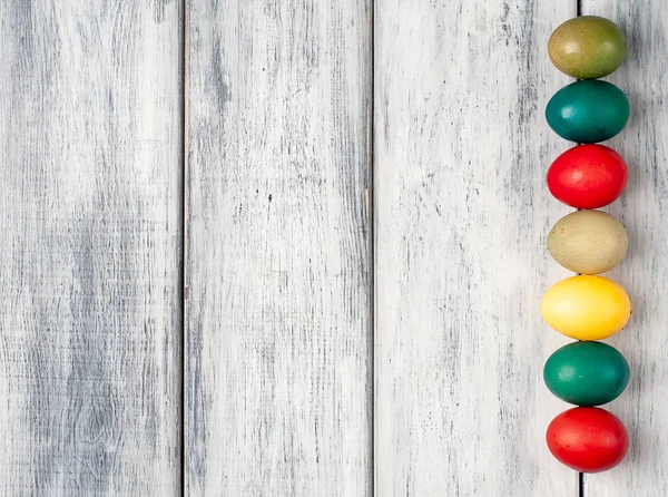 Pile Colorful Easter Eggs White Wooden Background — Stock Photo, Image